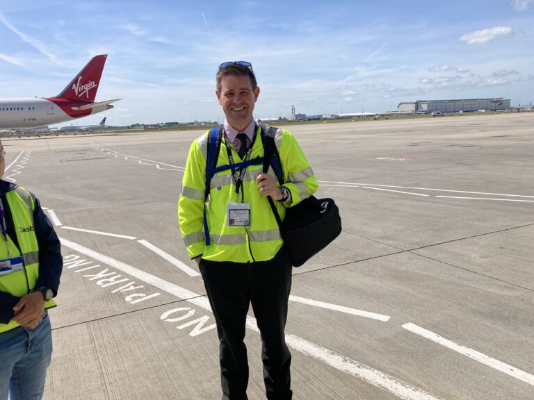 John Downer on the airfield at Heathrow Airport